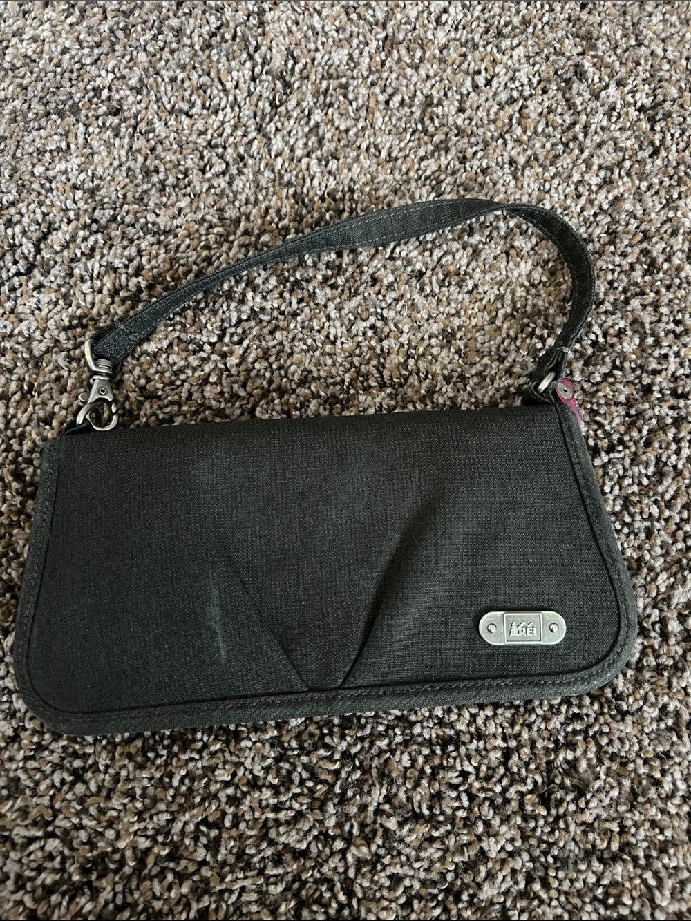 REI Black Canvas Wristlet with Metal Logo Plate
